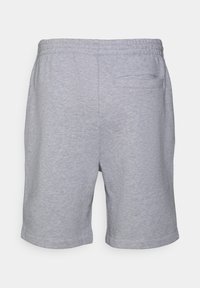 Grey athletic shorts made of soft, lightweight material. Features an elastic waistband and a single back pocket. Smooth texture.