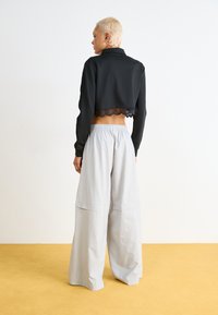 adidas Originals ZIP OFF - Tréningruha alsók - grey two