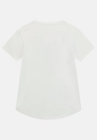 T-shirt blanc à manches courtes avec un ourlet arrondi et un col rond. Fabriqué en tissu doux, sans motifs ni accents visibles.