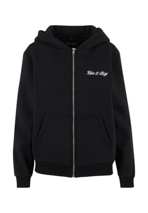 Black zip-up hoodie made of cotton blend fabric. It features a front kangaroo pocket, ribbed cuffs, and "Rise & Slay" embroidery on the chest.
