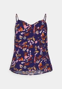 Kukallinen toppi tummansinisessä kankaassa, jossa on vaaleanpunaisia, oransseja ja vihreitä kukkia, ohuet säädettävät hihnat sekä kaareva helma kevyellä rakenteella.