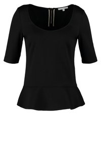 Top peplum negro hecho de tela de jersey, con escote redondeado, mangas cortas y cremallera en la parte trasera con detalles dorados.