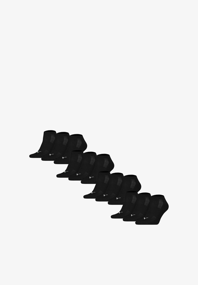 Calzini neri alla caviglia con un design texture, tessuto morbido e dettagli in bianco sul logo discreto. Il pacchetto include più paia disposti in fila.