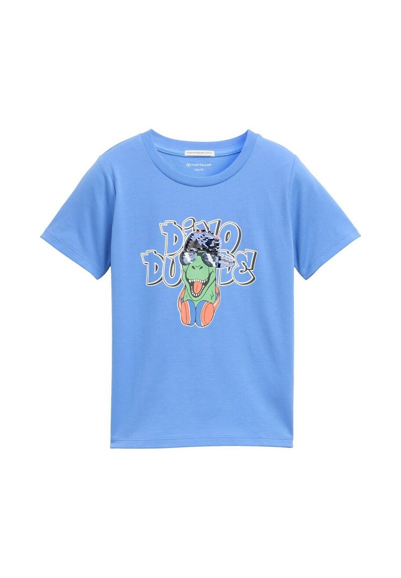 Zila kokvilnas t-krekls ar grafiku, kurā attēlots dinozaurs ar saulesbrillēm un austiņām, ko papildina teksts "Dino Dude!" jautrā fontā.