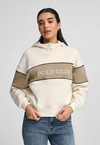 Hoodie beige e crema con tasca a marsupio, logo ricamato "POLO CLUB", strisce orizzontali a contrasto e cappuccio regolabile con cordino.