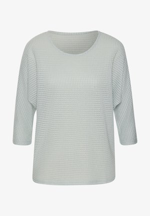 Maglietta in maglia testurizzata azzurro chiaro con scollo rotondo e maniche a tre quarti. Presenta una vestibilità rilassata e un sottile motivo orizzontale.