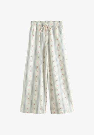 Kerged, lahtised püksid elastse vööosaga. Omavad vertikaalseid siniseid triipu ja väikeseid punaseid lillemotiive heledal taustal.