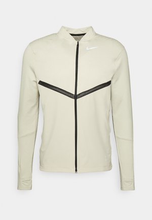RUN - Kurtka do biegania - rattan/silver