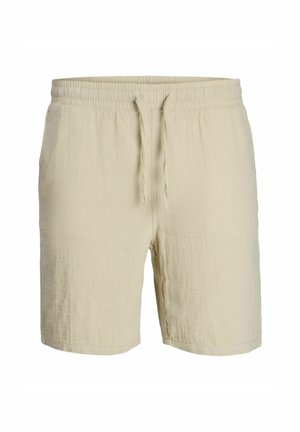 Beige drawstring shorts made of lightweight fabric, featuring a textured pattern and an elastic waistband for comfort.