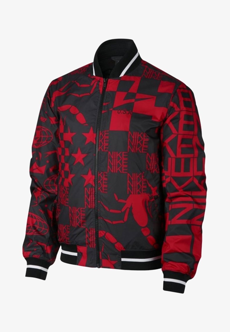 Red and black bomber jacket featuring an all-over print of stars, logos, and abstract shapes. Finished with ribbed cuffs and waistband.