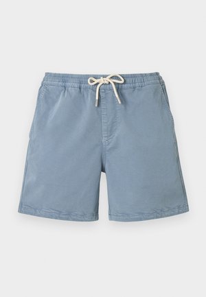 Light blue casual shorts with elastic waistband and white drawstring, front pockets, and a mid-thigh length.