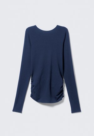 Navy long-sleeve top made of soft fabric featuring a round neckline and gathered detailing at the sides for a fitted shape.
