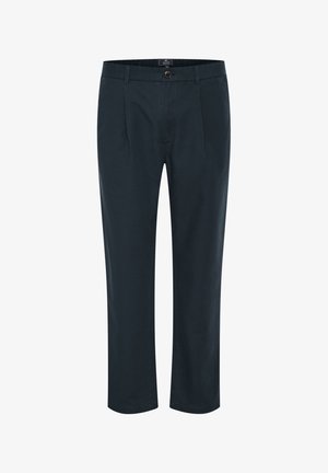 Tamsiai mėlyni kelnių, pasižyminčių tiesiu kirpimu, mygtukų uždarymu, priekiniais klostėmis ir dviem šoniniais kišenėmis; pagaminti iš sklandžios, lengvos medžiagos.