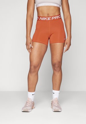 Nike Performance SHORT - Tights - burnt sunrise/white