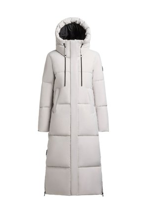 Pikk, heledast hallist vahukoostisest jope, millel on kapuuts, must vooder, lukuga kinnitamine, kaks eesmist taskut ja elastsed nöörid reguleerimiseks.