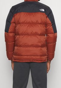 The North Face Bunda z prachového peří - brown