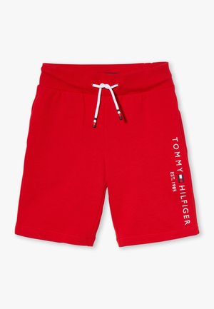 Czerwone, casualowe szorty z białym ściągaczem i pionowo nadrukowanym napisem „Tommy Hilfiger Est. 1985” oraz logo na prawej nodze.