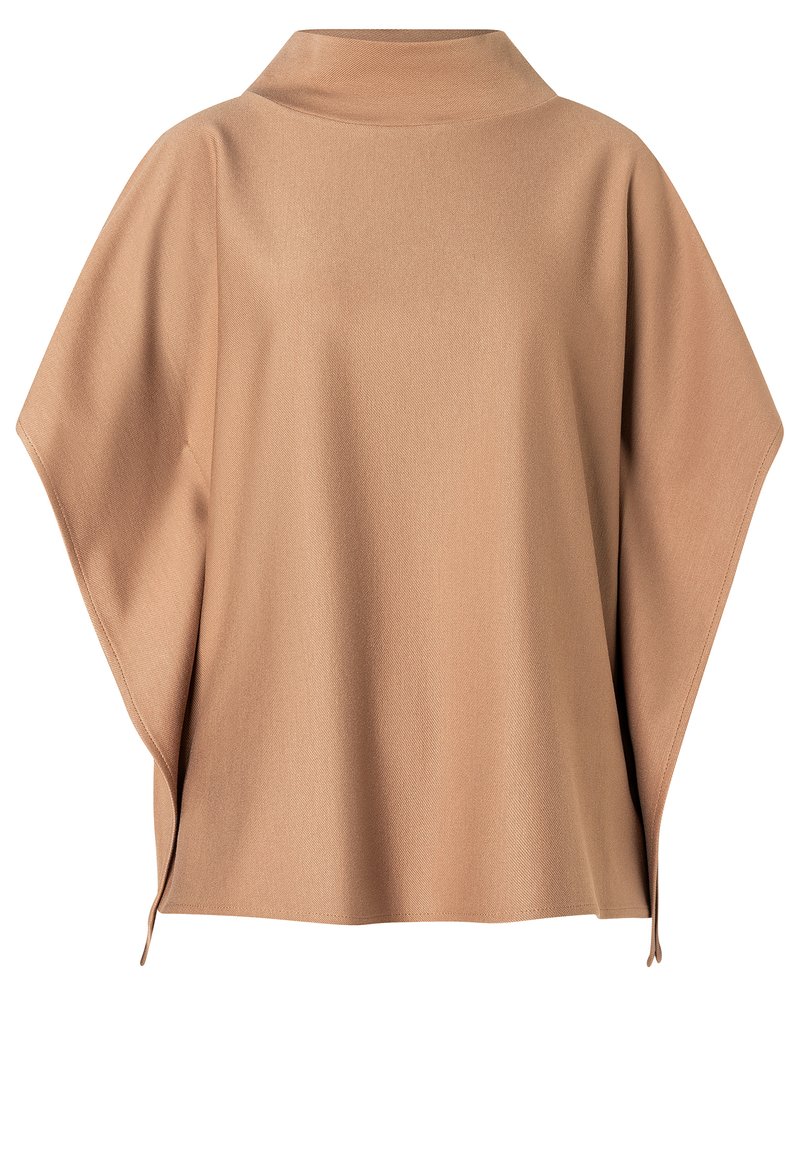 Light brown oversized top with a stand collar, made of textured fabric, featuring wide sleeves and subtle side slits for comfort.