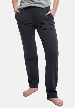 Dunkelgraue Jogginghose aus weichem Stoff, ausgestattet mit Seitentaschen und einem elastischen Bund für zusätzlichen Komfort. Gerader Beinanschnitt mit minimaler Textur.