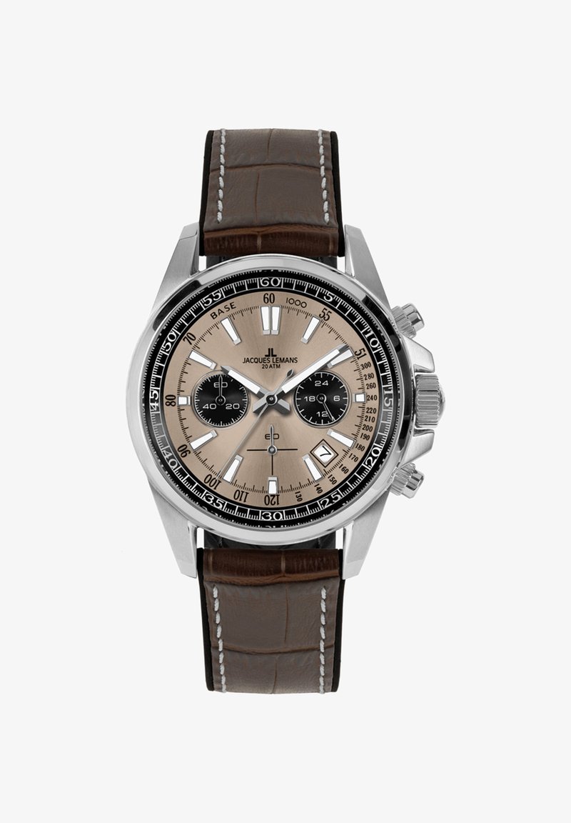 Kronografas su sidabriniu nerūdijančio plieno korpusu, šviesiai ruduo dialu, juodais subdials, rudą odinę juostą ir baltomis siūlėmis.