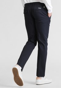 BOSS ATHLEISURE Tygbyxor - dark blue