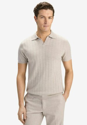 Ljust beige kortärmad polo skjorta med V-ringning, som har vertikal ribbad textur och en avslappnad passform. Mjuk stickad material.