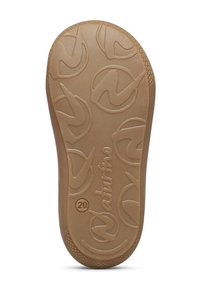 Suela de un zapato marrón con patrones circulares y la palabra "Naturino" marcada en la suela, de talla 20.