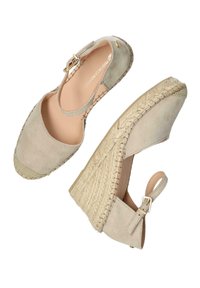 Beige suede wedge sandals with braided jute detailing, open heel, and ankle strap featuring a gold buckle. Smooth inner lining.