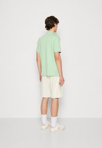 Calvin Klein BUTTON - Poloskjorter - quiet green