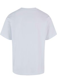 White cotton t-shirt, short sleeves, crew neck, relaxed fit, smooth texture, no visible graphics or patterns, back view only.