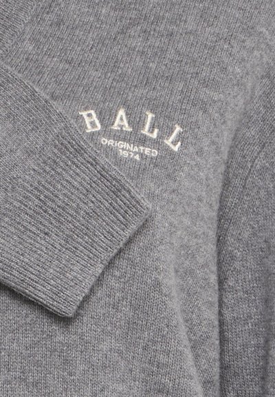 Gray knit sweater with a ribbed collar. Features embroidered text “BALL” and "ORIGINATED 1974" in white. Smooth texture and classic design.