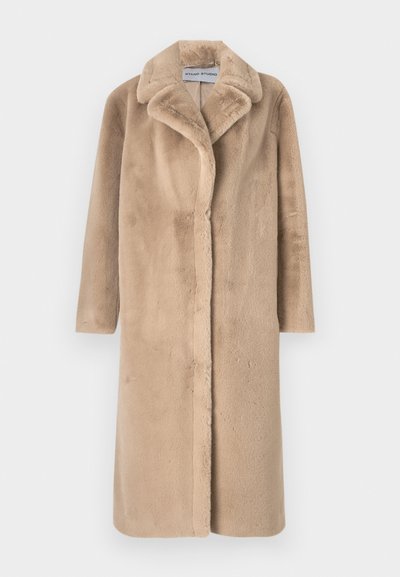 Beige faux fur coat with a notched collar, button closure, and long sleeves. Soft texture and knee-length design. Back view.