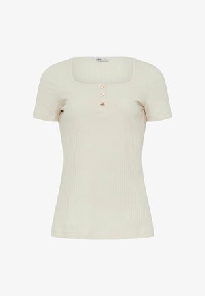 Crèmekleurig geribbeld kortärmelig shirt met een vierkante halslijn en drie decoratieve gouden sterrenknopen aan de voorkant in het midden.