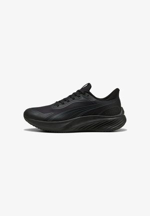 Schwarze Sportschuhe mit einem schlanken Design, aus leichtem Material gefertigt, mit strukturierten Details und einer Gummisohle für besseren Halt.