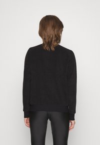 Puma Träningsjacka - black