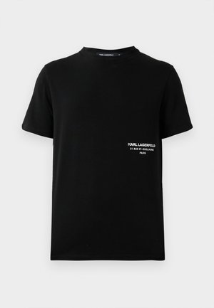 Camiseta negra de manga corta con el texto blanco "KARL LAGERFELD 21 RUE ST-GUILLAUME PARIS" en la parte izquierda del pecho.