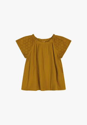 Top giallo senape con maniche corte e larghe. Il busto presenta un tessuto texture; le maniche hanno dettagli in broderie anglaise. Scollatura arrotondata.