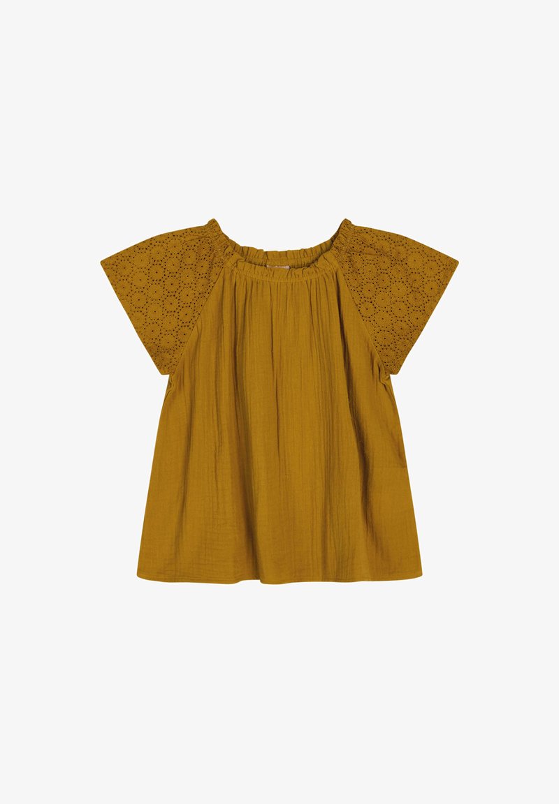 Top giallo senape con maniche corte e larghe. Il busto presenta un tessuto texture; le maniche hanno dettagli in broderie anglaise. Scollatura arrotondata.