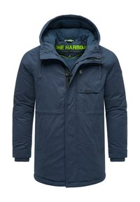 Mörkblå vinterjacka med huva, dragkedjestängning, flera fickor och textilfoder; har elastiska muddarna och en diskret logotyp.