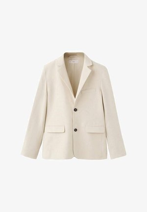 Blazer beige con risvolto a incavo, chiusura con un bottone singolo, due tasche frontali e una tasca sul petto. Texture liscia e vestibilità su misura.