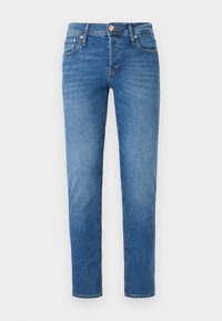 Jean en denim bleu slim avec poches avant, passants de ceinture et fermeture par bouton, présenté sur un fond clair uni.
