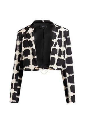 Kurzer Blazer aus schwarz-weißem Stoff mit geometrischem Muster, mit satiniertem Finish und Kettenakzent an der Vorderseite.