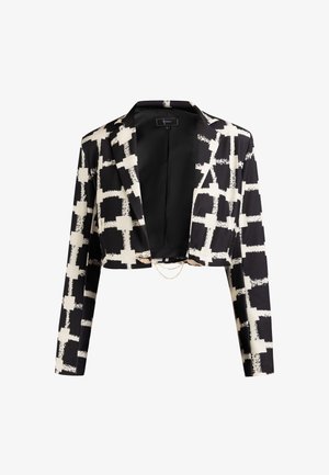 Krótkie marynarka w czarno-białym materiale z geometrycznym wzorem, z satynowym wykończeniem i łańcuszkowym akcentem z przodu.