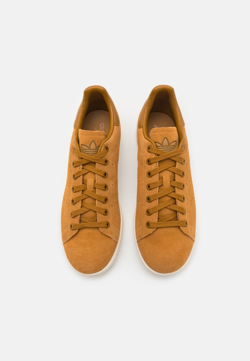 bronze adidas trainers