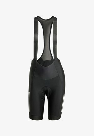 Zwarte fietsbibshorts met een mesh achterkant, geplastificeerd zitvlak en reflecterende accenten aan de zijkanten. Gemaakt van flexibele, vochtafvoerende stof.