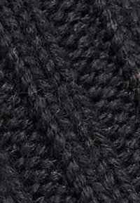 Tessuto in maglia nero che mostra una superficie testurizzata con un aspetto morbido e soffice. Fibra sciolta e una leggera lucentezza sono visibili.