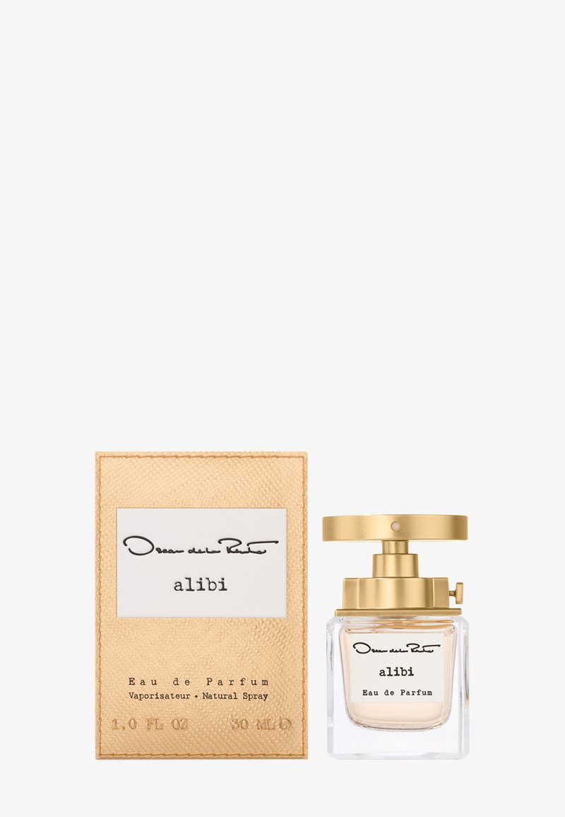 Oscar de la Renta Alibi Eau de Parfum Flasche mit goldenem Deckel neben passender, goldstrukturierter Box, 30ml Naturalspray.
