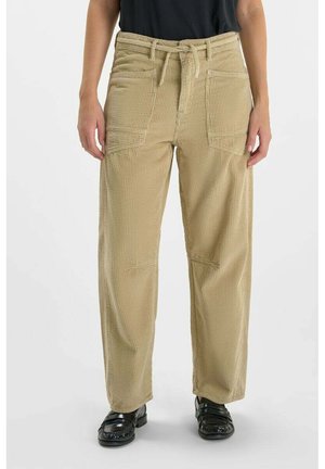 Beige corduroy trousers with a relaxed fit, featuring side pockets, a drawstring waist, and a textured fabric for added detail.