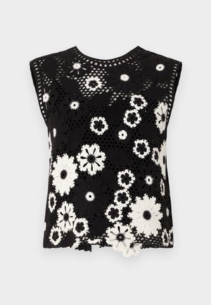 Black sleeveless top featuring a floral crochet design in white, with a textured surface and a round neckline.