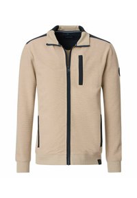 Beige zip-up jas met zwarte accenten, structuurstof, opstaande kraag, een ritsborstzak en geribbelde manchetten.